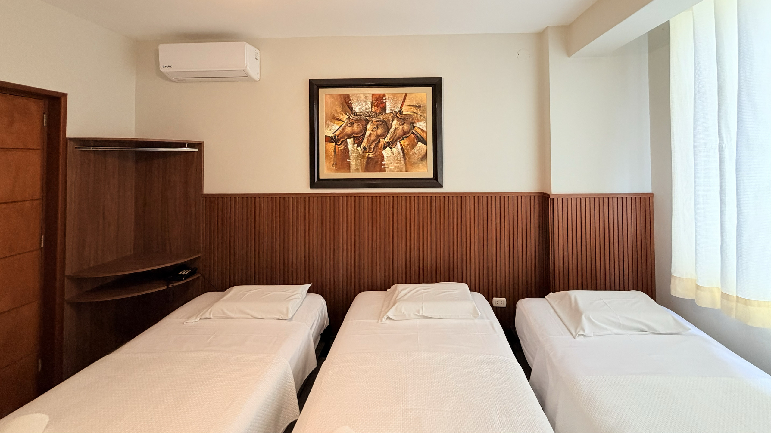 Habitación Triple del Hotel Rivera del Río